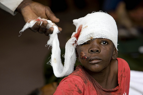 A Haitian boy receives treatment at an ad hoc medical clinic at MINUSTAH's logistics base. Creative Commons/by Logan Abassi, The United Nations