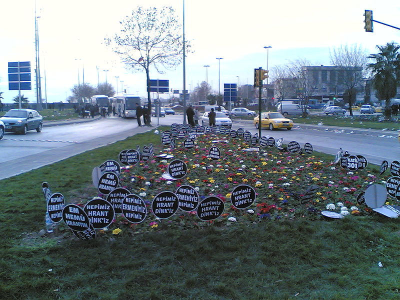 placards planted in flower beds after Hrant Dink's funeral/ Wikimedia Commons